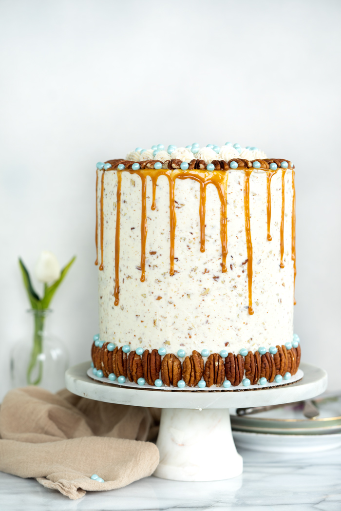 Pecan Turtle Cake - Chocolate, pecans and caramel make this cake awesome. cake, recipe, pecan turtles, candy, layer cakes, cake decorating