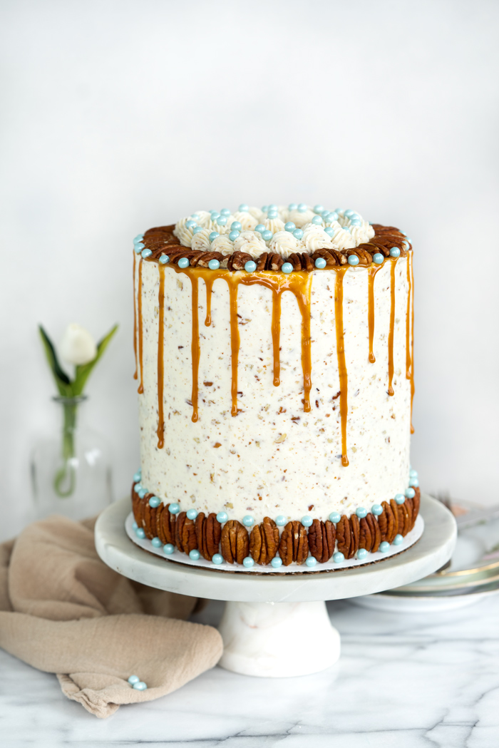 Pecan Turtle Cake - Chocolate, pecans and caramel make this cake awesome. cake, recipe, pecan turtles, candy, layer cakes, cake decorating