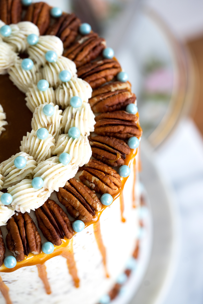 Pecan Turtle Cake - Chocolate, pecans and caramel make this cake awesome. cake, recipe, pecan turtles, candy, layer cakes, cake decorating