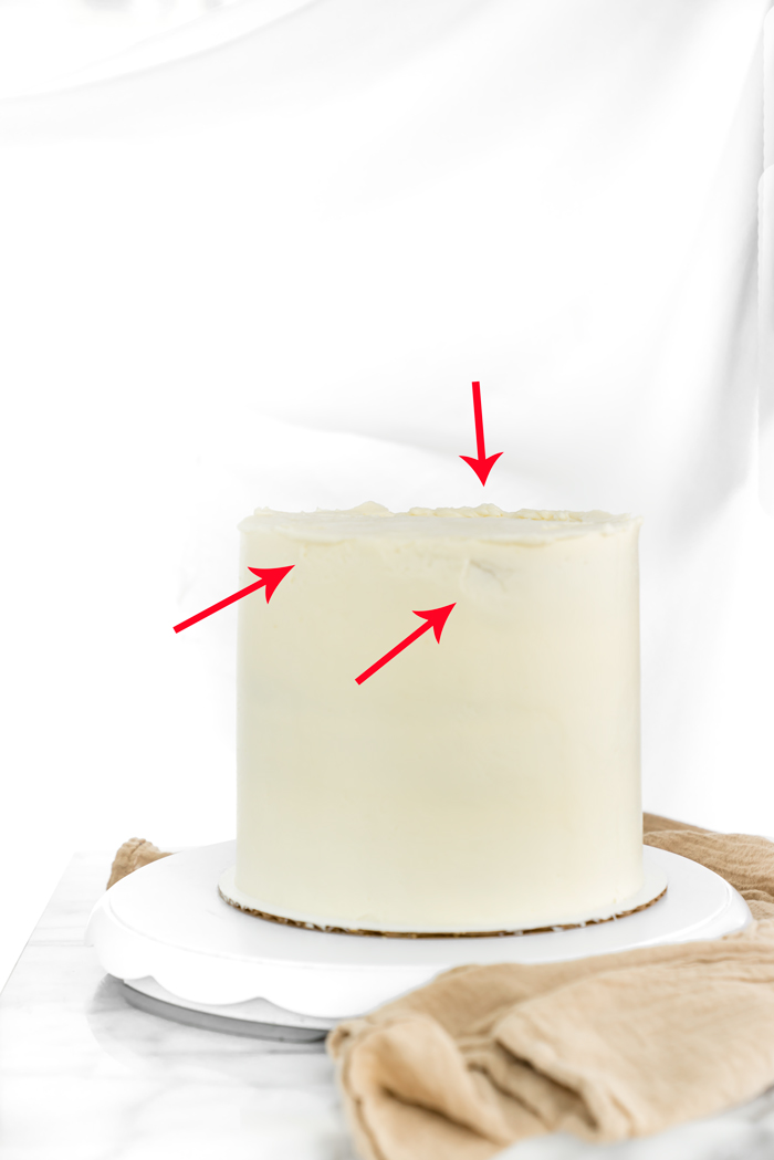 How To Create A Smooth Buttercream Finish. Step by step tutorial on how to get that coveted smooth buttercream finish. | thesugarcoatedcottage.com #cakedecoarting #buttercream #cake #dessert #recipe