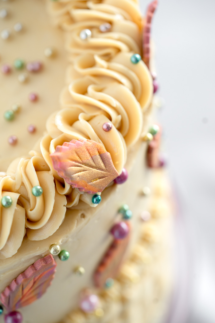 Pumpkin Spice Cake, Salted Brown Sugar Buttercream. Moist pumpkin spice cake coated and filled with salted brown sugar buttercream. #cake #thanksgiving #cakedecorating #dessert