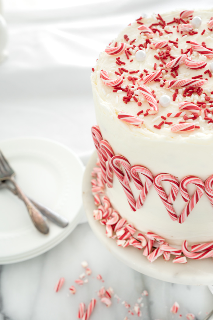 Moist delicious chocolate cake filled and coated in peppermint cream cheese buttercream! #chocolate #cake #creamcheesebuttercream #christmas