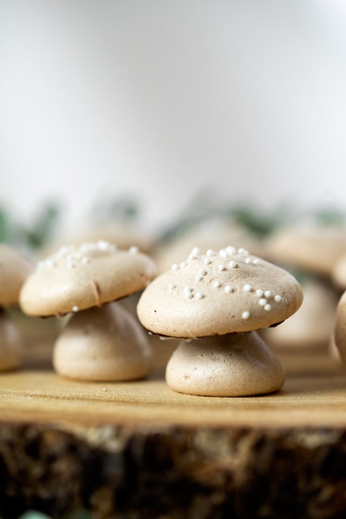 Sweet, edible, delicious meringue woodland mushrooms are great for decorating any dessert or to eat by themselves. #cakedecorating #meringuemushrooms