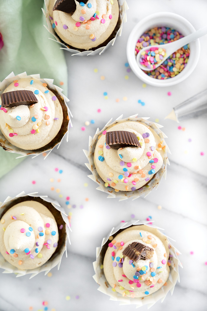 Banana Cupcakes with Peanut Butter Buttercream. Moist, delicious banana cupcakes and a swirl of peanut butter buttercream. #cupcake #banana #peanutbutter