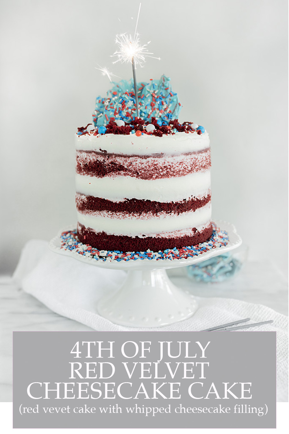 4th of July Red Velvet Cheesecake Cake. Moist, tender crumb red velvet cake with layers of whipped cheesecake filling. #4thofjuly #redvelvet #cheesecake #cake #redvelvetcheesecake