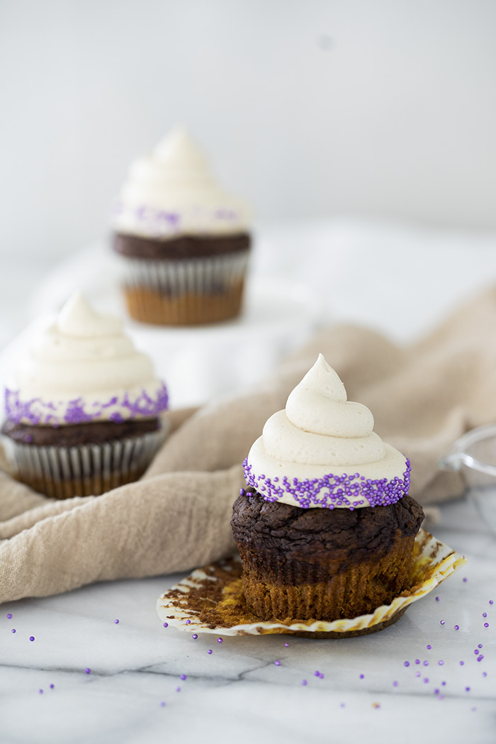 Pumpkin Chocolate Espresso Cupcakes. Part Starbucks PSL cake and part chocolate espresso cake and a swirl of espresso buttercream! | thesugarcoatedcottage.com #cupcake #psl #starbuckspsl #pumpkin #pumpkincupcake #chocolatecupcake #espressobuttercream #coffeebuttercream