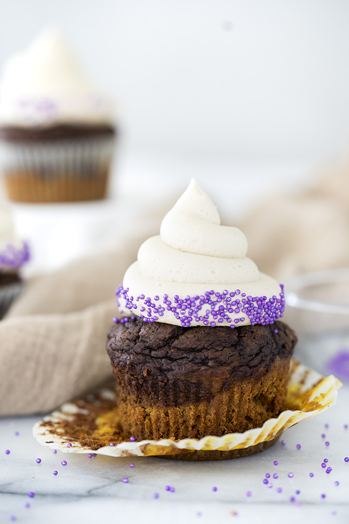 Pumpkin Chocolate Espresso Cupcakes. Part Starbucks PSL cake and part chocolate espresso cake and a swirl of espresso buttercream! | thesugarcoatedcottage.com #cupcake #psl #starbuckspsl #pumpkin #pumpkincupcake #chocolatecupcake #espressobuttercream #coffeebuttercream