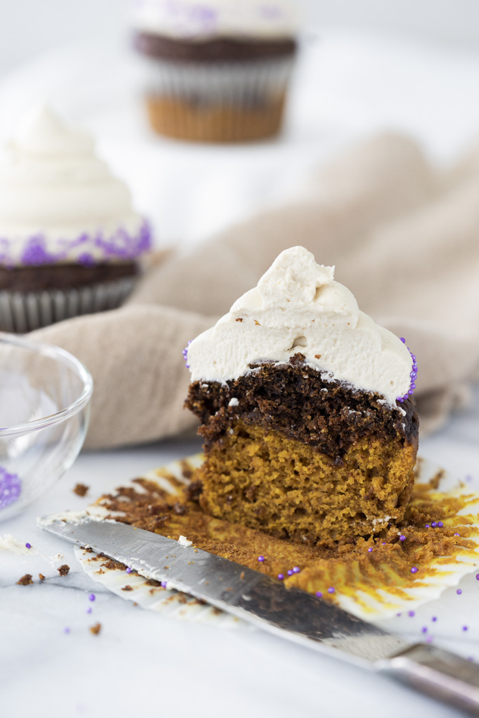 Pumpkin Chocolate Espresso Cupcakes. Part Starbucks PSL cake and part chocolate espresso cake and a swirl of espresso buttercream! | thesugarcoatedcottage.com #cupcake #psl #starbuckspsl #pumpkin #pumpkincupcake #chocolatecupcake #espressobuttercream #coffeebuttercream